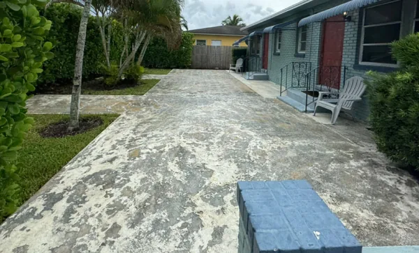 The same driveway after: even, clean concrete