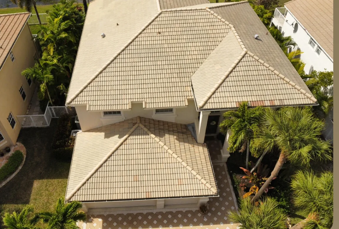 A Royal Palm Beach home's tile roof after a soft wash, seen from above